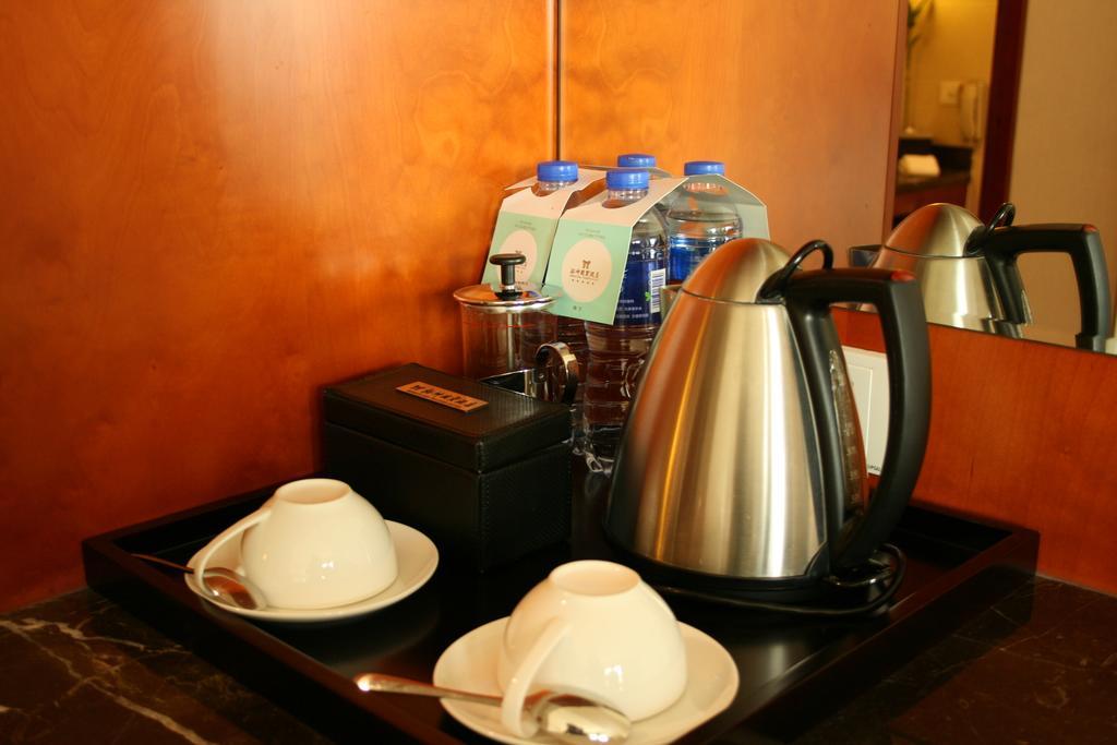 Merryland Traders Hotel Changshu Kamer foto