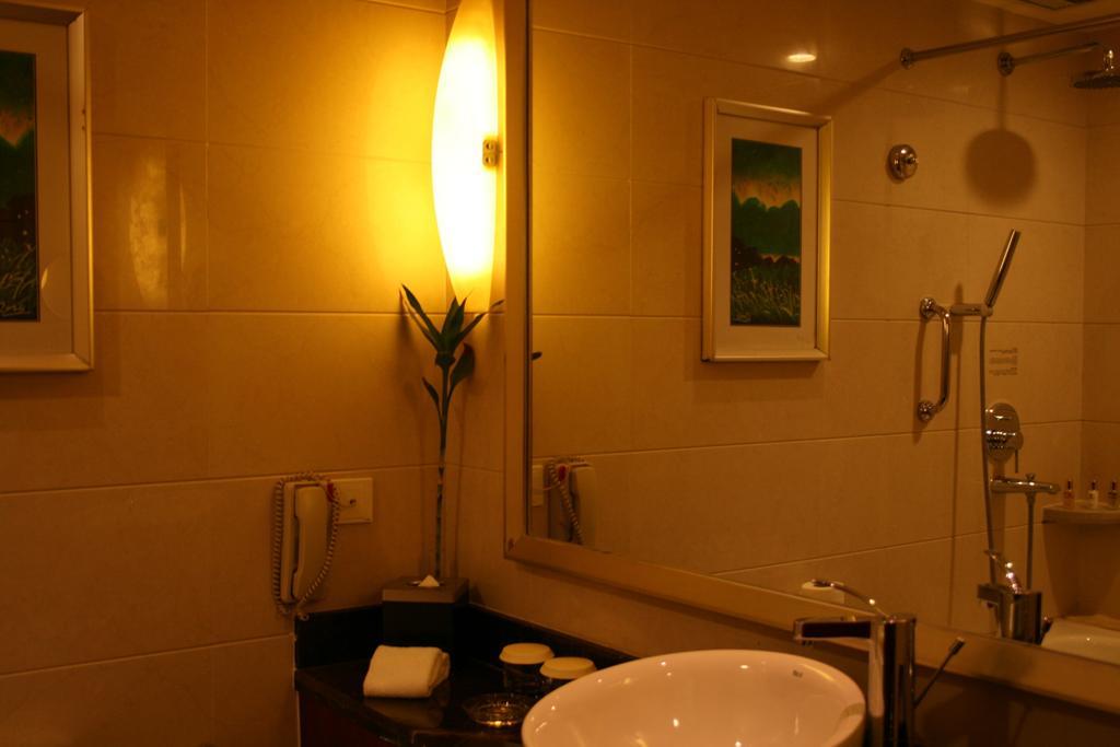 Merryland Traders Hotel Changshu Kamer foto