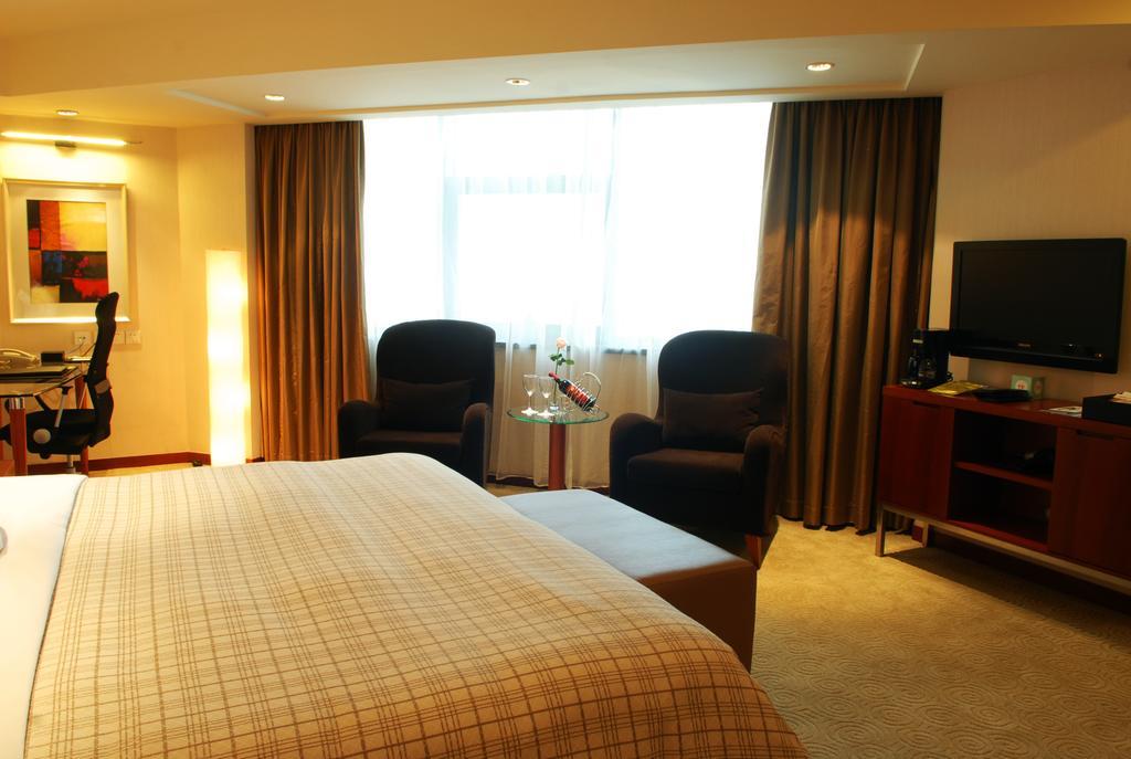 Merryland Traders Hotel Changshu Kamer foto