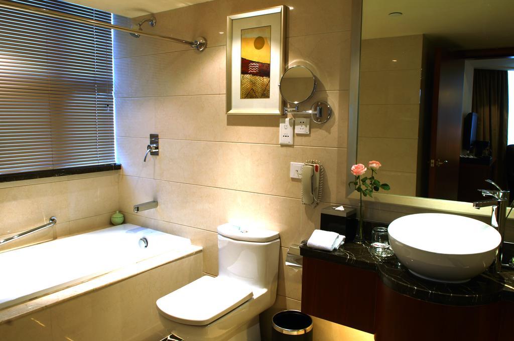 Merryland Traders Hotel Changshu Kamer foto