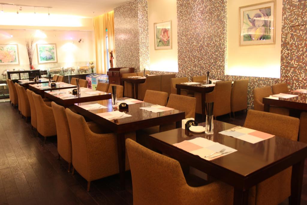 Merryland Traders Hotel Changshu Buitenkant foto